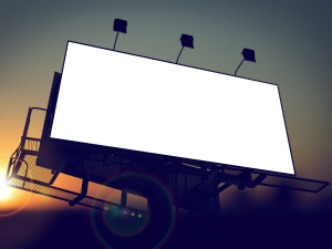 Blank Billboard on the Rising Sun Background.